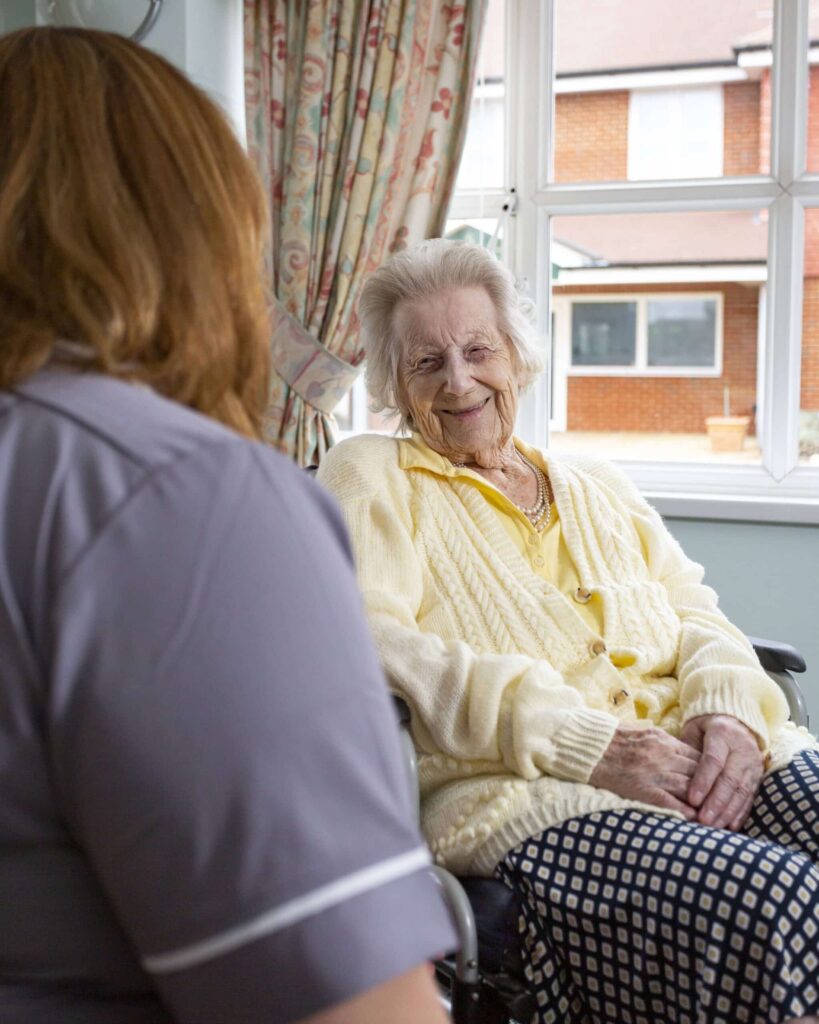 Resident Smiling at Carer