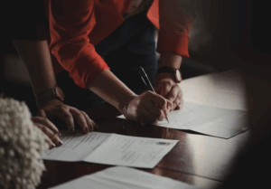 LPA paperwork being signed by people