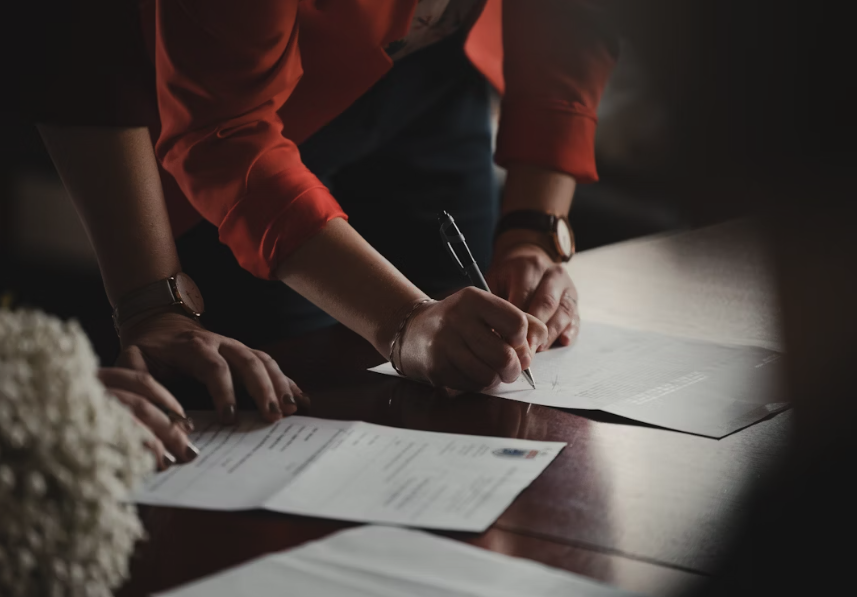 LPA paperwork being signed by people