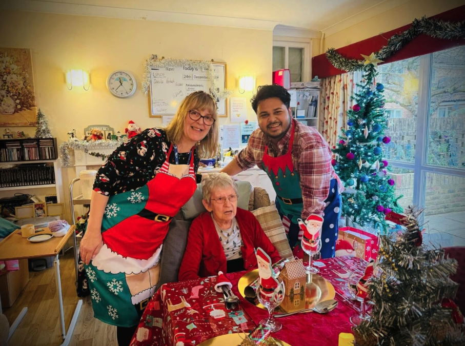 residents and staff celebrating christmas
